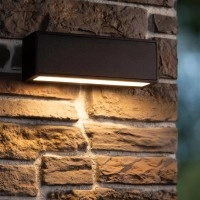 SUTTON saules LED āra sienas lampa ar krēslas sensoru 1 × 1,5 W 2700K–3000K melna (Lucide)