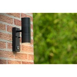 ARNE-LED IR outdoor wall spotlight with PIR motion and day/night sensors, 2 × GU10 LED, 5 W each, 2700 K, black (Lucide)