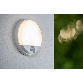 HUPS IR round outdoor wall light with PIR motion and day/night sensors, integrated LED, 10 W, 950 lm, 3000 K, white (Lucide)