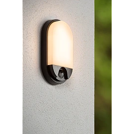 HUPS IR outdoor wall light with microwave motion and day/night sensors, integrated LED, 10 W, 950 lm, 3000 K, black (Lucide)