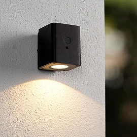 RAMIN solar outdoor wall light with PIR motion and day/night sensors, solar LED, 1 W, 100 lm, 2700/3000 K, black (Lucide)